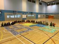 largest text formation made of paper airplanes (16)