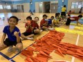 largest text formation made of paper airplanes (18)