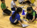 largest text formation made of paper airplanes (6)