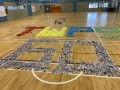 largest text formation made of paper airplanes (9)