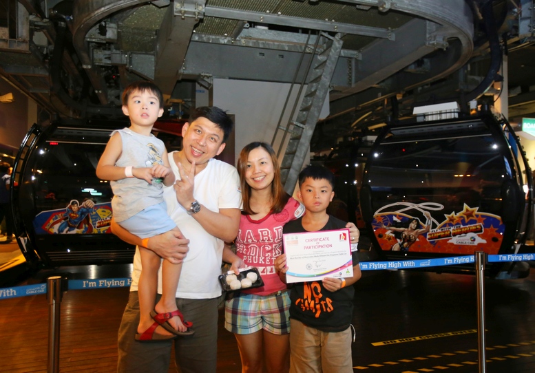 Family With The First Box Of Mooncakes Made In A Cable Car