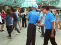 Fastest Time To Pass 10 T-shirts Along A 100-People Chain