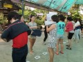 Fastest Time To Pass 10 T-shirts Along A 100-People Chain