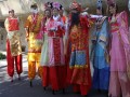 Largest Mass Performance Of Stilt Walkers