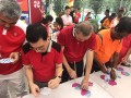 Most Number Of People Painting CDs Together (12)