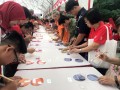 Most Number Of People Painting CDs Together (13)
