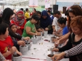 Most Number Of People People Pounding With Mortars And Pestles Together
