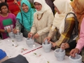 Most Number Of People People Pounding With Mortars And Pestles Together