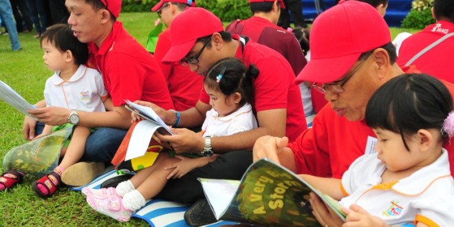 Most Number Of Fathers And Children Reading Together
