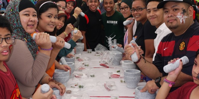 Most Number Of People People Pounding With Mortars And Pestles Together