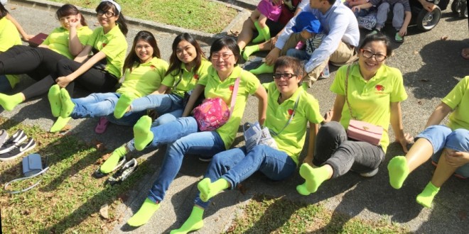 Most Number Of People Posing With Socks In A Similar Colour