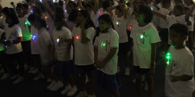 Most Number Of People Wearing Illuminated Personalised T-shirts