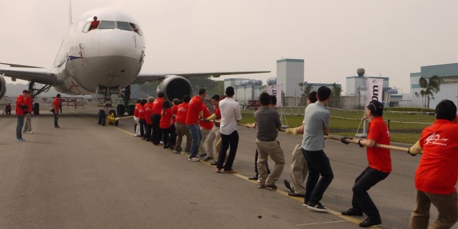Largest Airplane Pulled By A Group Of People