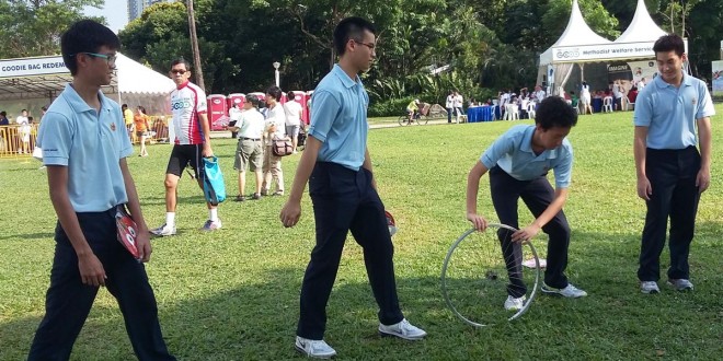 Fastest Bicycle Rim Rolling Relay By A Group Of 100