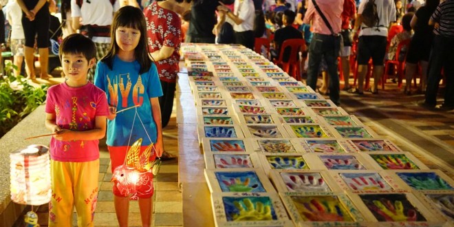 Largest Display Of Handprints Inscribed On Clay