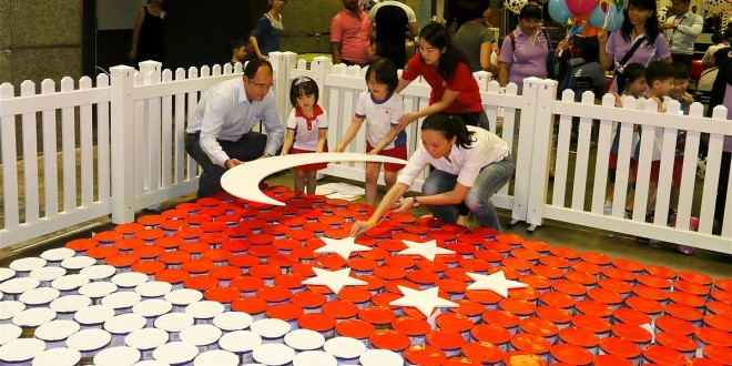Largest National Flag Made Of Milk Tins