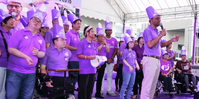 Largest Gathering Of People In Purple Hats