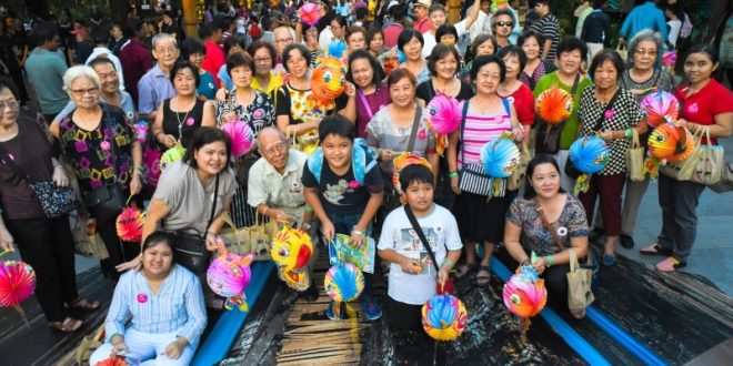 Most Number Of People Walking With Animal-Themed Lanterns